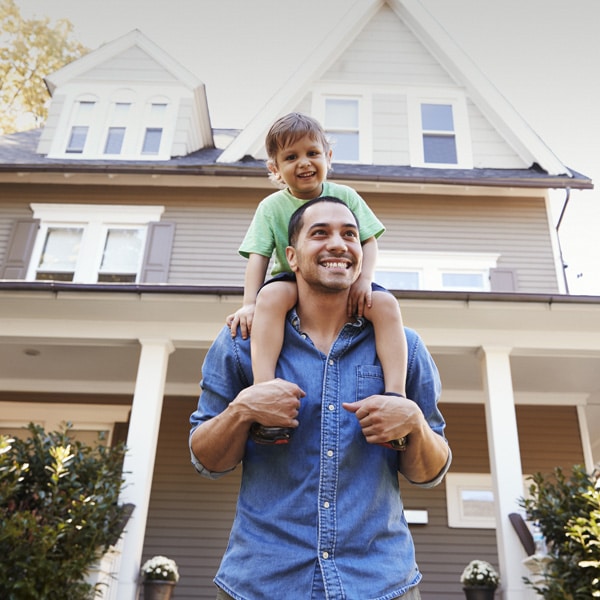 a man standing in front of a building
