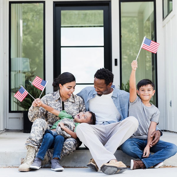 a group of people sitting on a bench